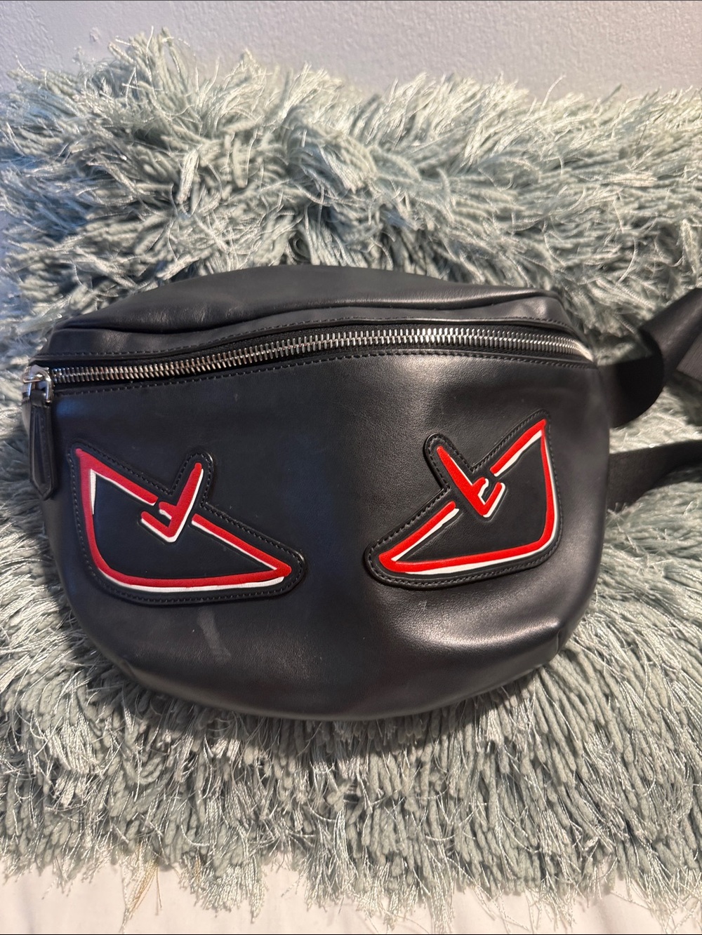 Fendi Black Leather Men’s Belt Bag with Red Eye Motif